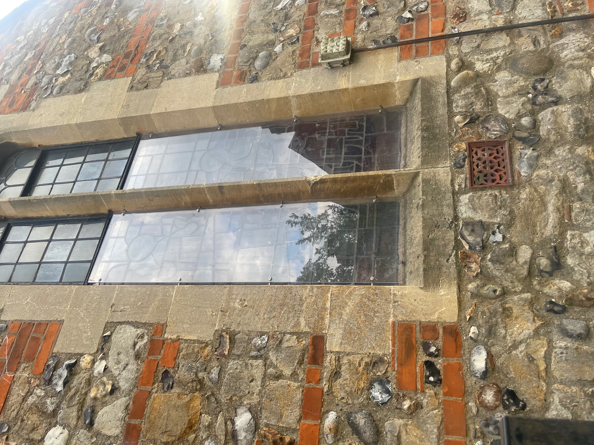 Photograph of window protection on Saint Raphael window