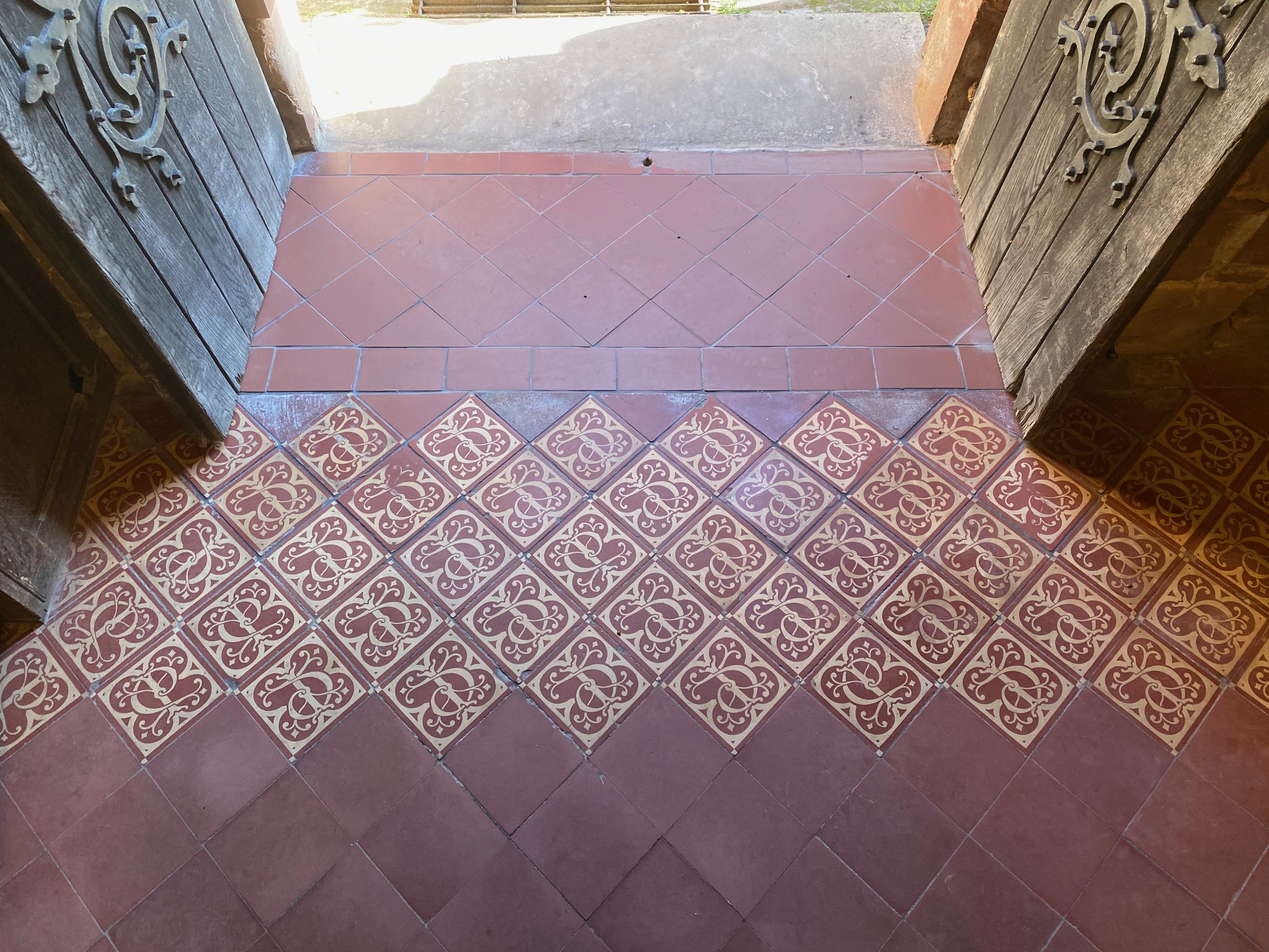 Photograph of reinstated tile floor tower entrance