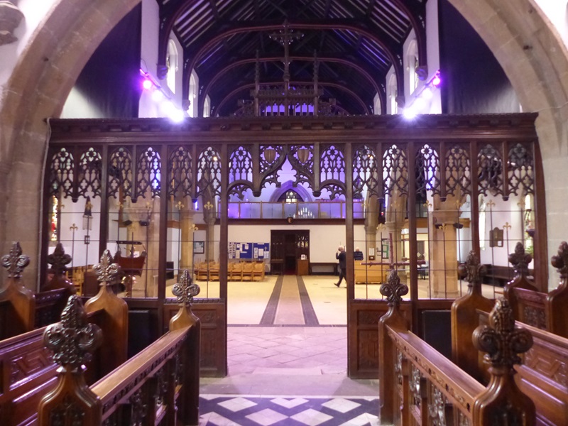Interior looking west through chancel screen.